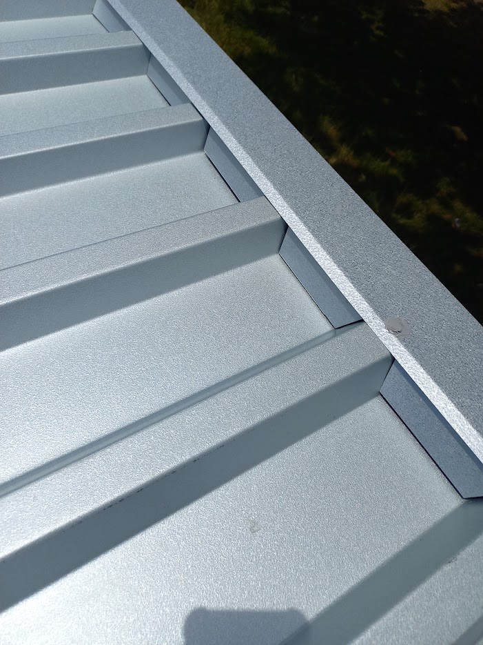 Roof detail showing barge capping and closures